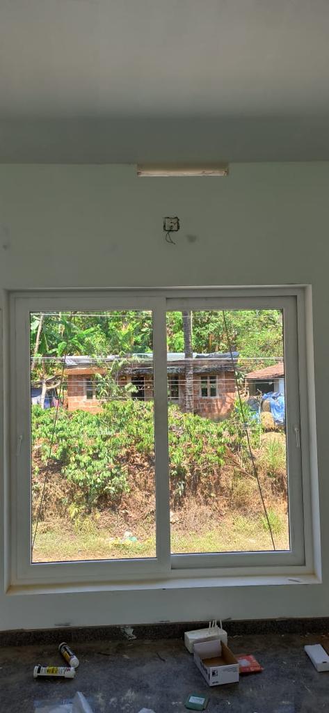 Saint-Gobain facade - glass facade panel installation Kochi Kerala | Precise Homes